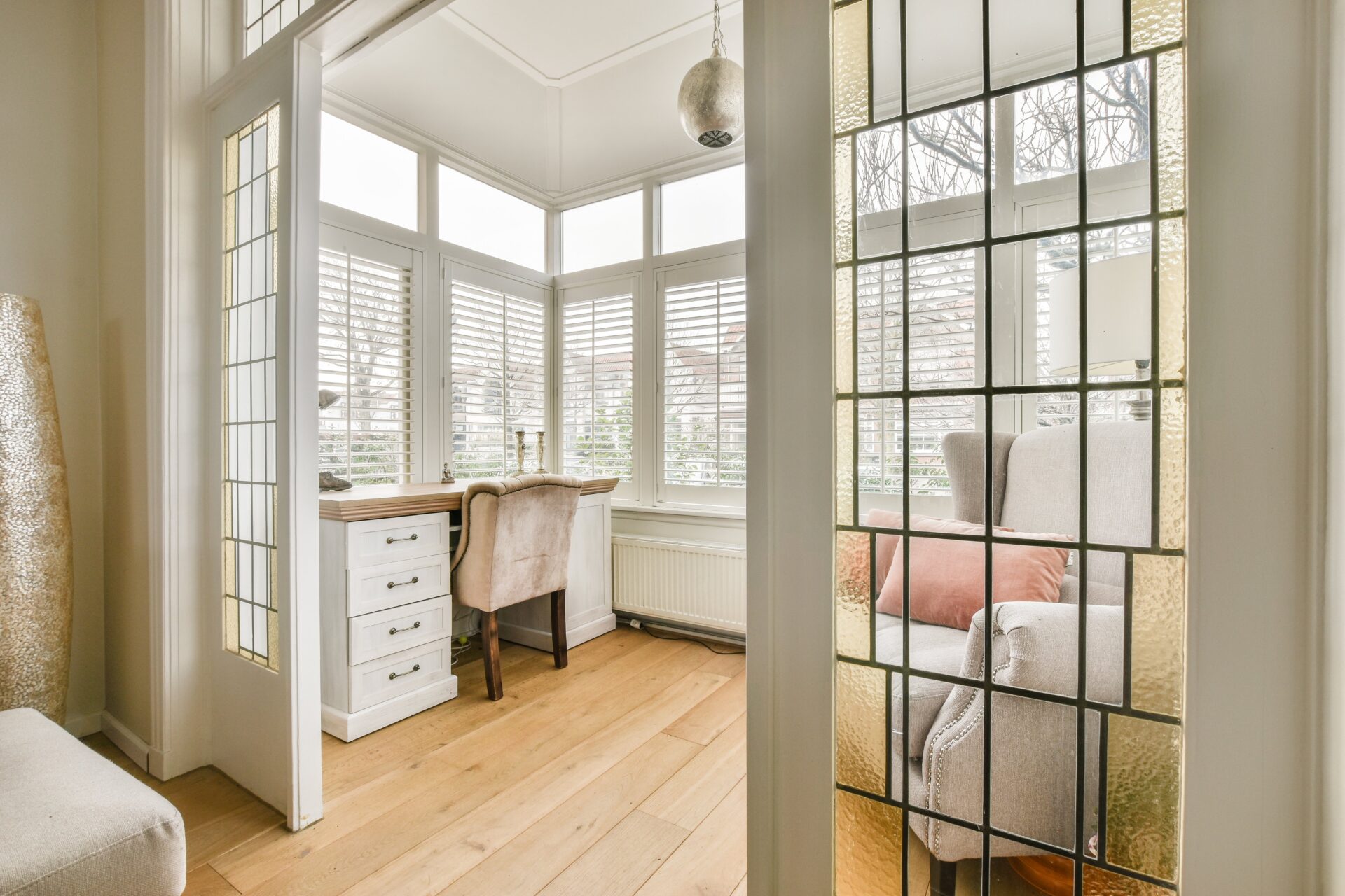Interior shutters with adjustable louvers in a Tri-Cities home
